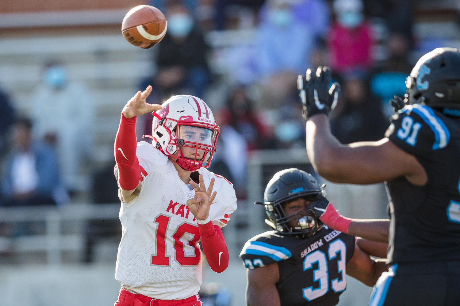 Katy High sophomore quarterback Caleb Koger (10) throws a pass during the Tigers’ 49-24 Class 6A-Division II regional semifinal win over Shadow Creek on Saturday, Dec. 26, at Freedom Field in Iowa Colony.